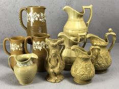 Good collection of nine ceramic jugs and vases to include parianware examples, possibly Davenport,