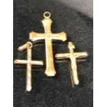 Three 9ct gold crucifix pendants approx 2.7g