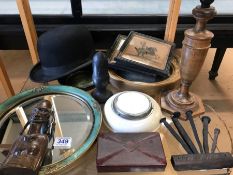 Collection of curios to include mirrors, Bakelite box, bowler hat, cast iron door stop etc