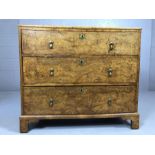 Small walnut set of three drawers with brass handles and locks, the walnut top having had some