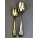 Two Georgian Hallmarked Silver spoons the larger dated 1793, the other 1818 by Thomas Streetin