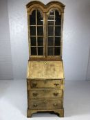 Bureau bookcase with brass detailing, glazed cupboards over, fall front to reveal Pidgeon holes