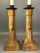 Pair of Robert 'Mouseman' Thompson oak candlesticks with iron sconces, of octagonal column form on