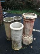 Collection of four antique chimney pots, the tallest approx 80cm in height