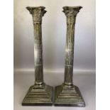 PAIR OF SILVER COLOURED LARGE CORINTHIAN COLUMN lamp bases, maker Walker & Hall, on weighted,