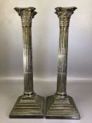 PAIR OF SILVER COLOURED LARGE CORINTHIAN COLUMN lamp bases, maker Walker & Hall, on weighted,