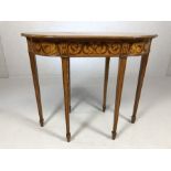 Inlaid occasional table of oval form with inlaid and six tapering legs, approx 81cm x 42cm x 69cm