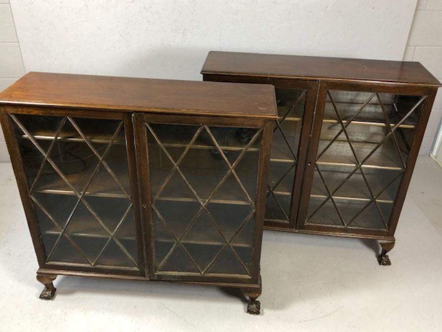 Pair of matching two door glass-fronted display cabinets, each with three shelves, on ball and - Image 2 of 4