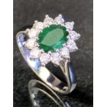 18ct White Gold ring set with Emerald and Diamonds in a Cluster setting size 'O'