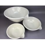 Set of three graduating china kitchen mixing bowls by the Edwardian Kitchen Company, the largest