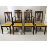 Set of six dining chairs to include two carvers with mustard yellow seat pads