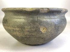 Grey Pottery early cheese or wine strainer, pierced holes to base approx 16cm in diameter