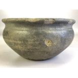 Grey Pottery early cheese or wine strainer, pierced holes to base approx 16cm in diameter