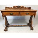 Two drawer console or hall table with carved upstand, turned stretcher and scroll feet, approx 110cm