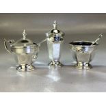 Silver hallmarked Birmingham three piece cruet set with blue glass liners, salt, pepper & Mustard