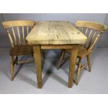 Small pine table and two pine chairs, table approx 1060x 62 x 8o cm tall