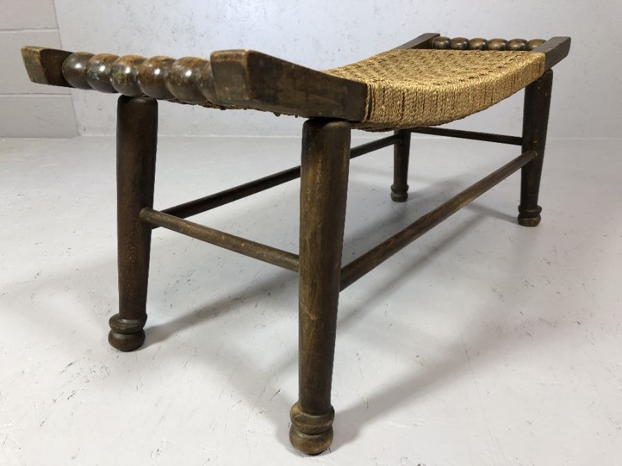 Oak framed rush seated bench / stool on turned tapering legs with bobbin turned handles, approx 85cm - Image 4 of 4