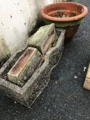 Concrete planter and terracotta plant pot