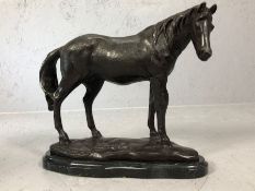 Bronze figure of a horse on a marble base, approx 23cm tall