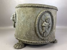 Lead twin handled pot/ planter with Lion head handles and on lion paw feet with oval plaques