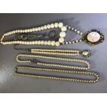 Collection of Jewellery to include beaded necklace with gold coloured framed bone cameo brooch and