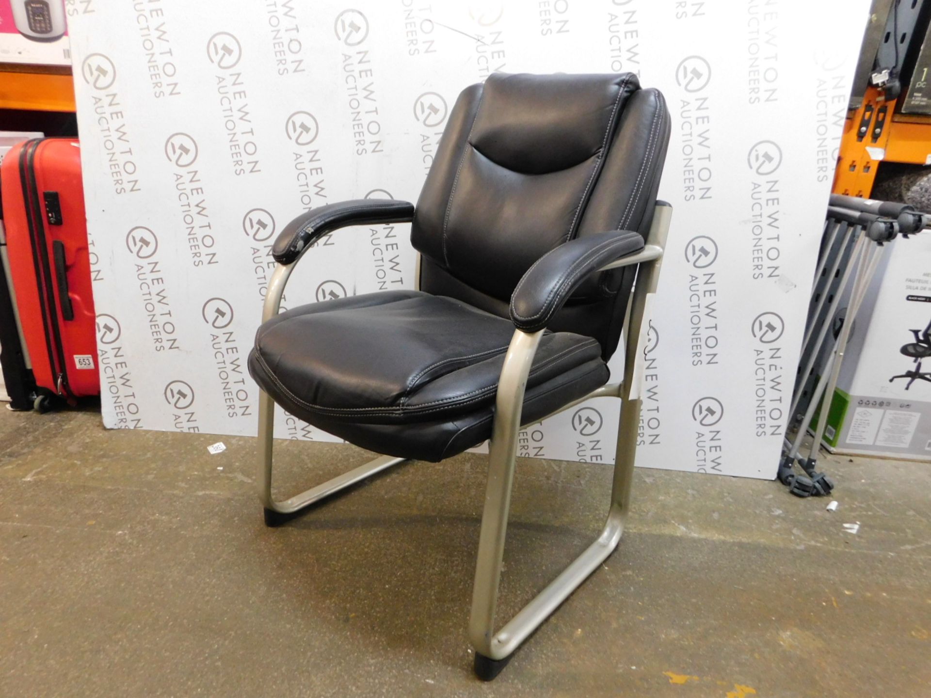 1 TRUE INNOVATIONS BLACK BONDED LEATHER OFFICE GUEST CHAIR RRP Â£119.99 (SMALL RIP)