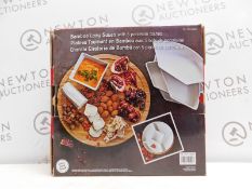 1 BOXED OVER AND BACK 4 PORCELIN DISHES AND 1 BAMBOO LAZY SUSAN RRP Â£29