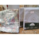 2 Simon May unused lace tablecloths and a floral patterned double duvet cover and a pair of