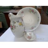 3 piece white ground jug and bowl set decorated coloured floral sprays,