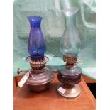 2 small paraffin lamps, 1 with cobalt blue glass flue,