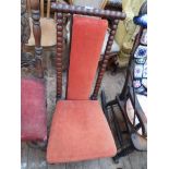 Edwardian high twist stemmed backed hall chair on brass casters,