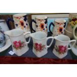 Set of three Keeling & Co ' Tokyo' water jugs decorated multi coloured floral sprays and three