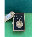 Gold on silver medallion with chain