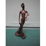 Keith Lee sculpture of a tall lady in evening gown