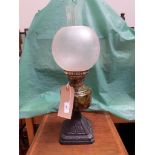 Victorian oil lamp with domed etched glass shade,