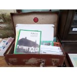 An attaché case containing Lincolnshire Memorabilia, camera instruction manuals etc.