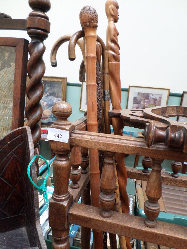 Oak hall umbrella stand with tin liner with carved and other walking sticks together with a mirror - Image 2 of 2