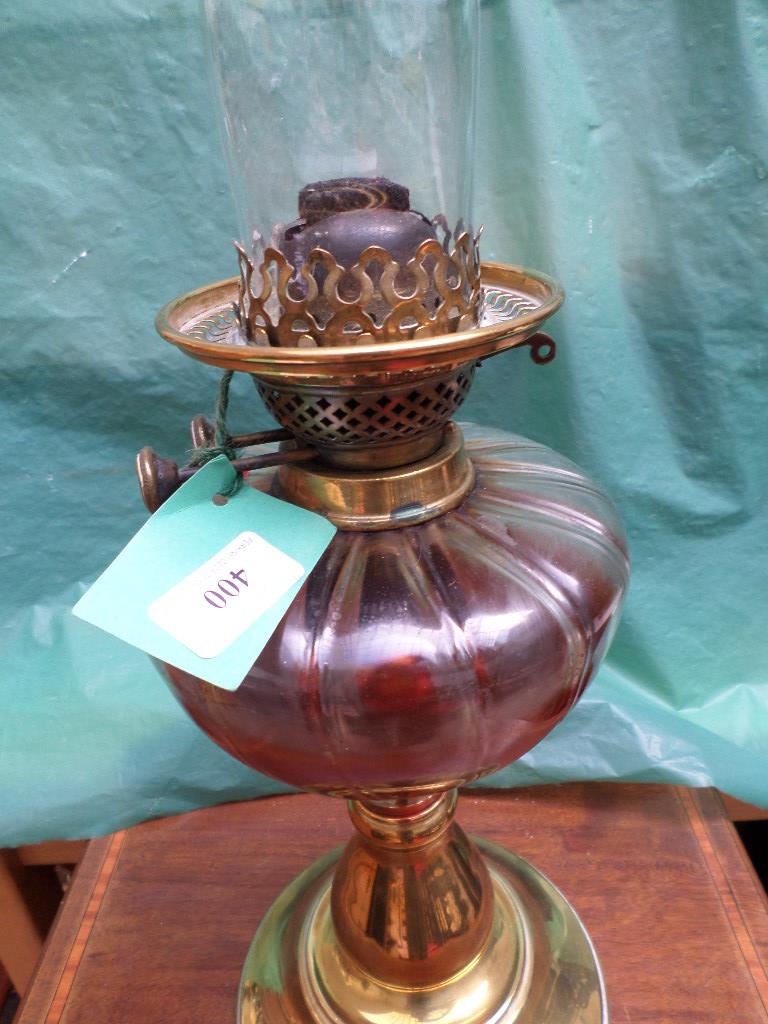 Brass oil lamp with glass chimney on circular brass base - Image 2 of 2