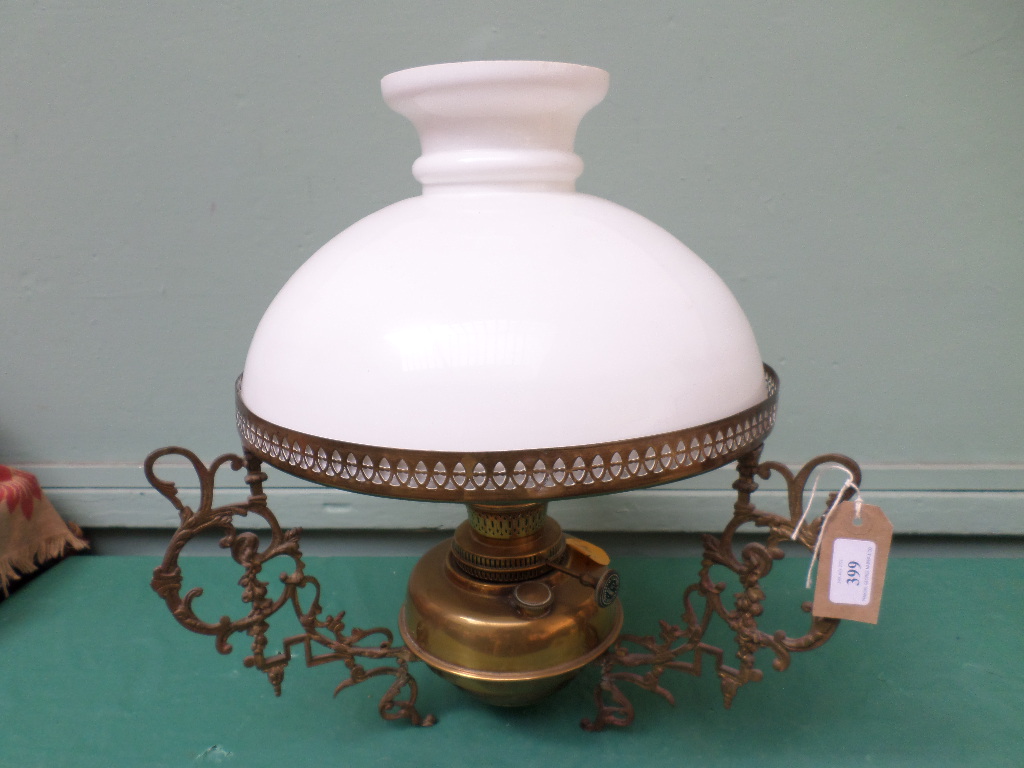 Brass hanging oil lamp with clouded glass shade and brass weight