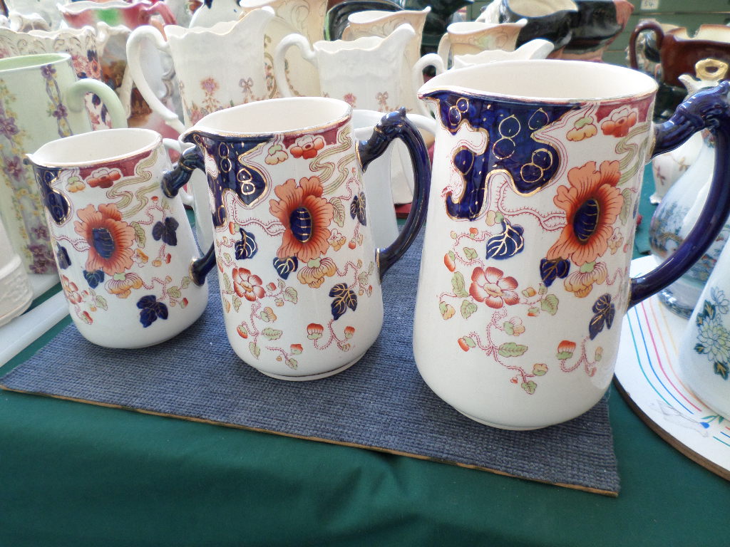 Set of three Keeling & Co ' Tokyo' water jugs decorated multi coloured floral sprays and three - Image 2 of 2