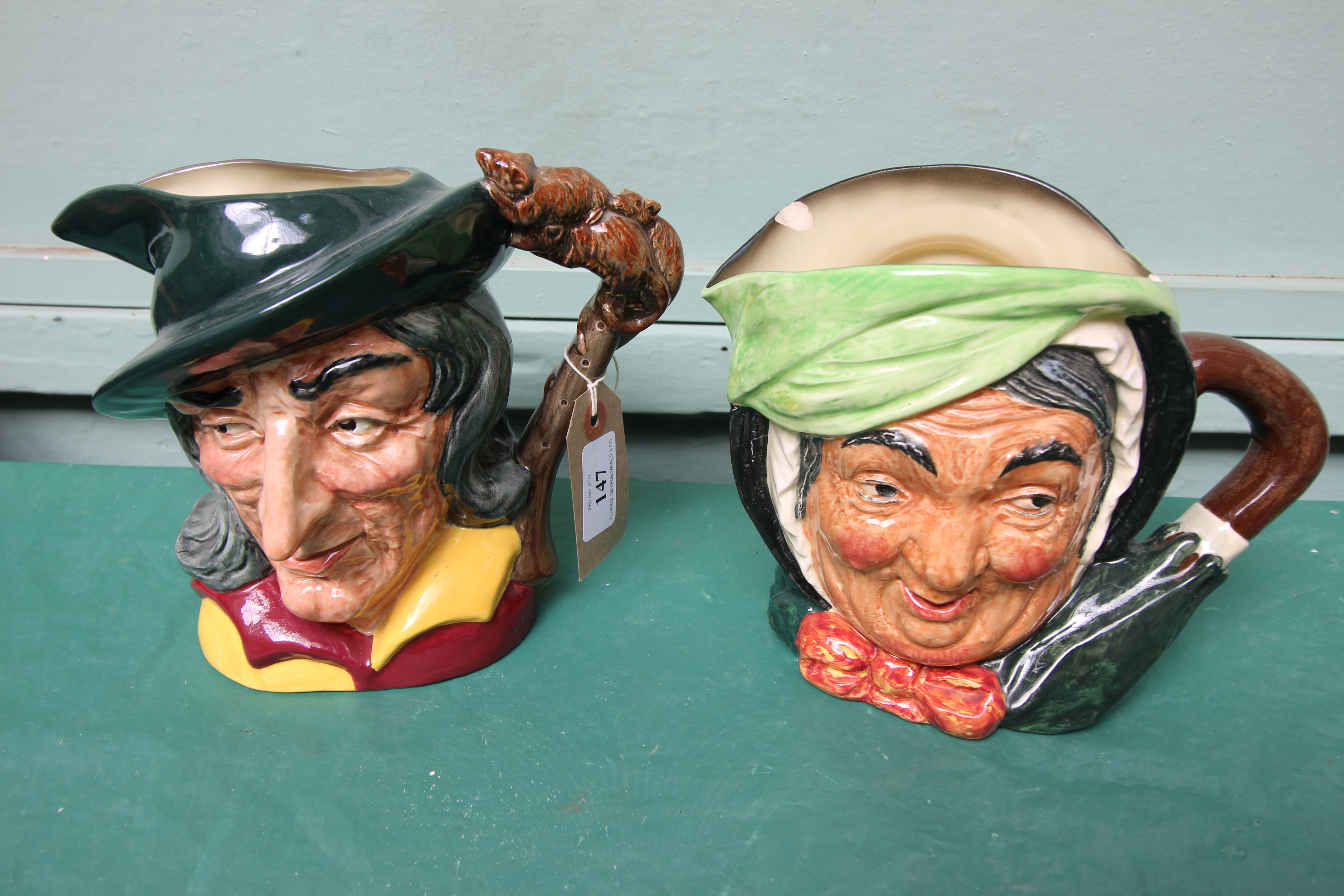 2 large Royal Doulton character jugs 'The Pied Piper' and ' Sairey Gamp' (chipped)