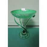 Most ornate green glass circular bowl and centre piece raised by three shaped supports on circular