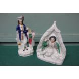 Staffordshire figure of a musician with bird and his flute and another of Richard III within tented