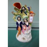 Staffordshire flatback Victorian mantel piece ornament of a Musician and his lady overlooked by
