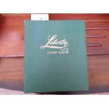 Liberty stamp album containing a selection of loose swaps incl.
