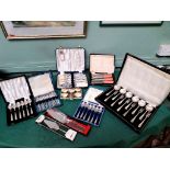 6 individual unused boxes of plated cutlery, cake knives, set of 6 plated napkin rings etc.