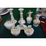 Most decorative white ground yellow floral patterned (8 piece) early 20th Century dressing table