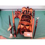 Sel. of decorative carved Native masks, spears etc.