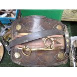 Leather and brass saddle