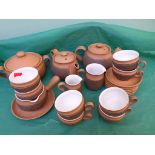 Part tea and Denby ware tea and dinner sets in two shades of brown including two tea pots